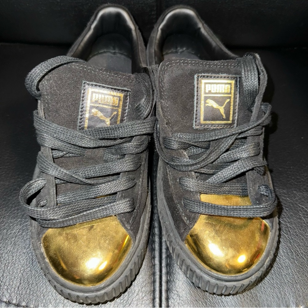 Puma Sneakers in Black/Gold